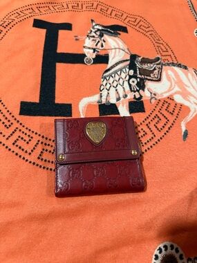 Gucci Burgundy Leather Compact Wallet with Gold Heart Emblem